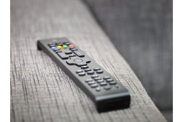 2480701_tv-remote-control-on-sofa (1)