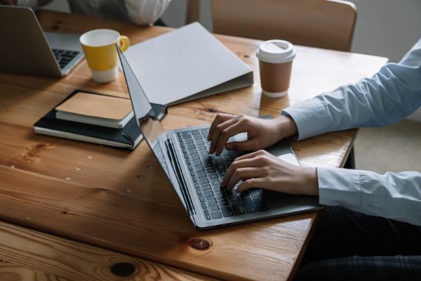 45189900 business team using a laptop is doing a marketing report on workplace