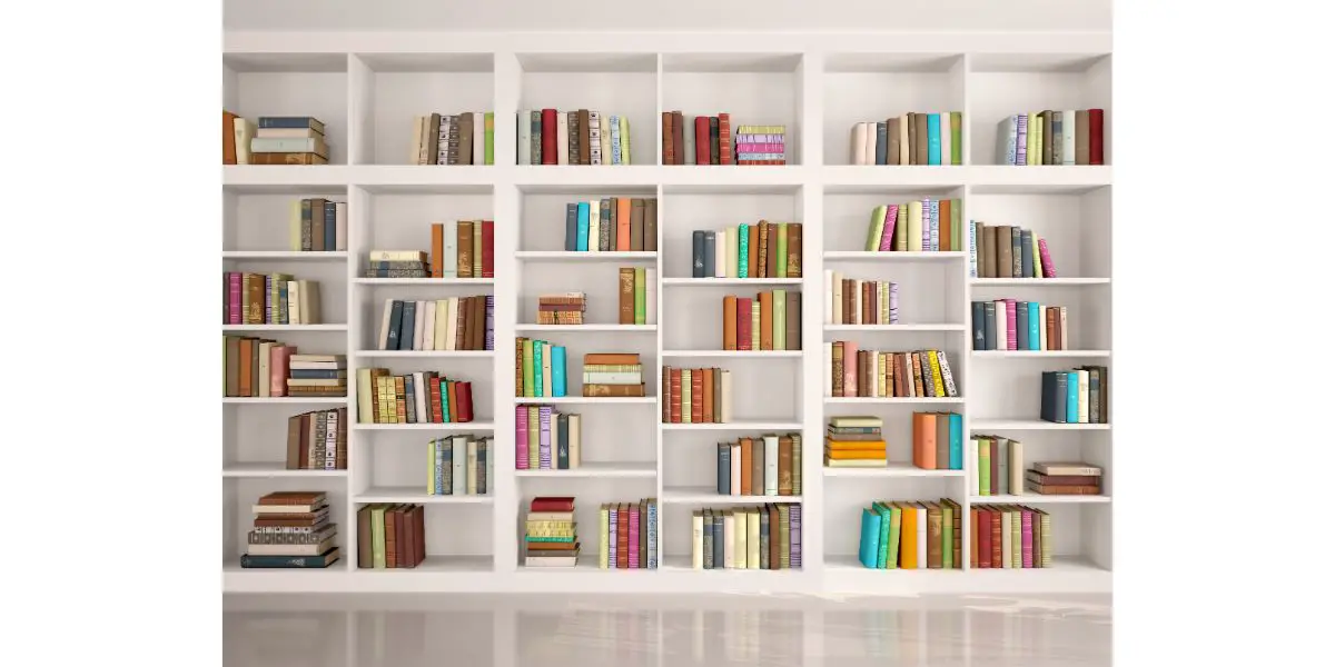 AdobeStock_104707663 3d illustration of White bookshelves with various colorful books