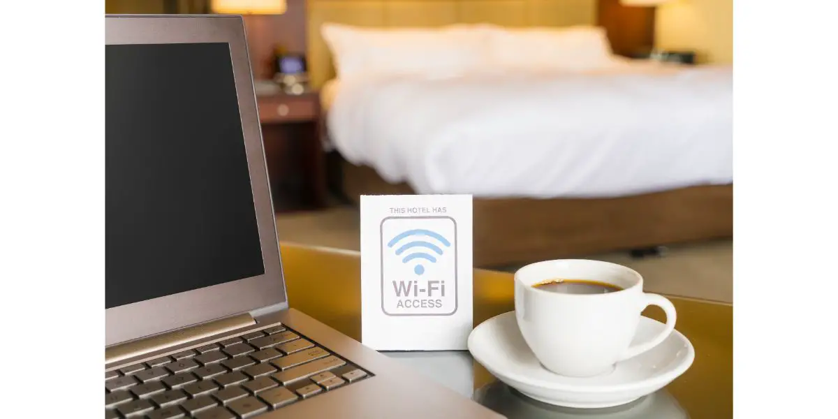 AdobeStock_116587825 Hotel room with wifi access sign