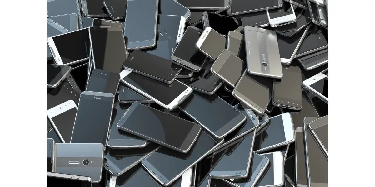 AdobeStock_137599622 huge pile of smart phones on top of each other