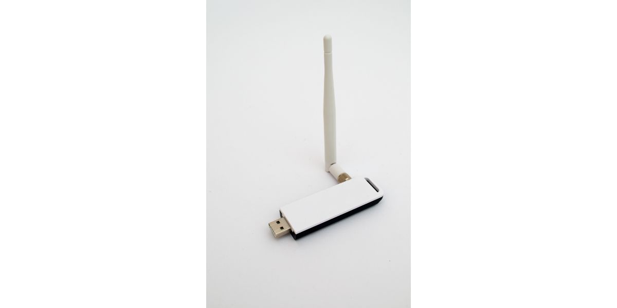 AdobeStock_148607451 White internet adapter on a white background