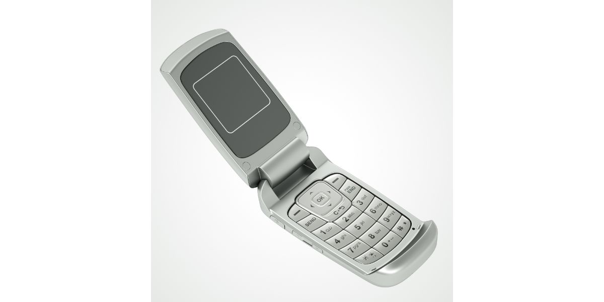 AdobeStock_23411315 flip phone opened up on white background