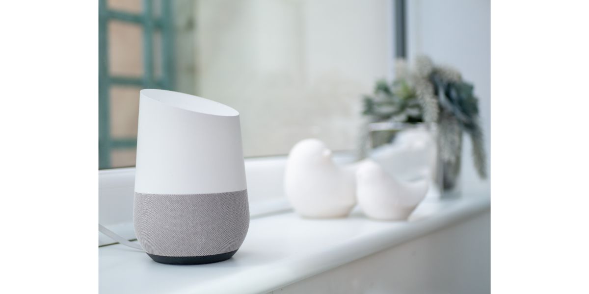 AdobeStock_265381084 smart home speaker on windowsill in conservatory