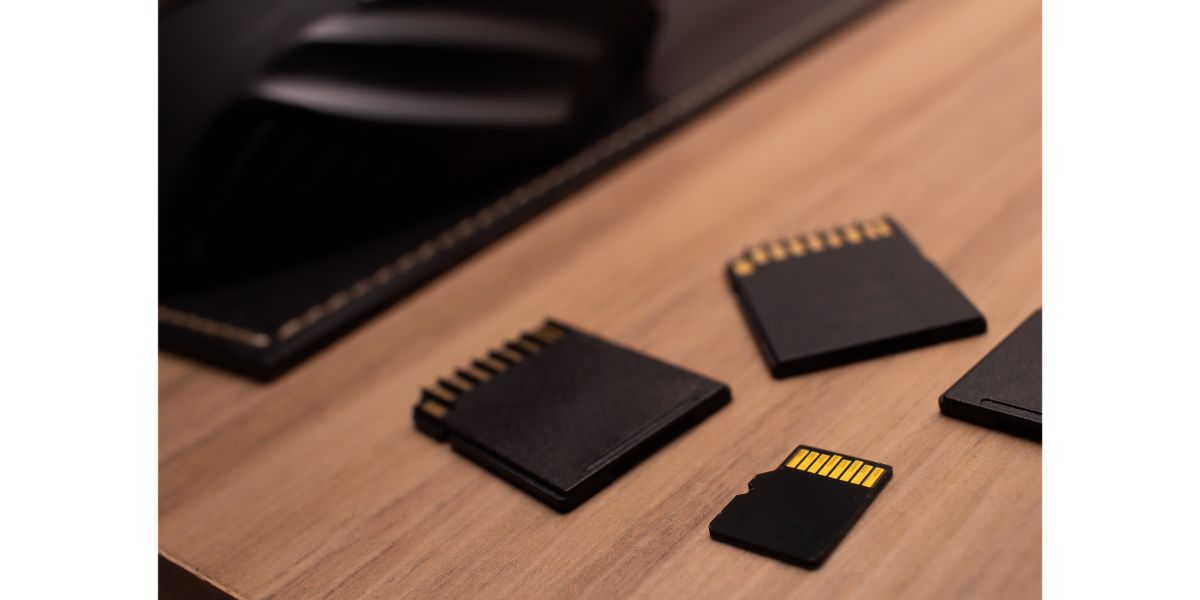 AdobeStock_281274981 focused Picture of a microsd memory card and sd adapters.