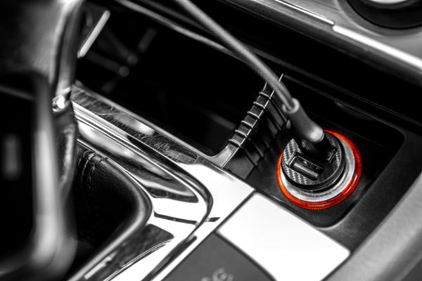 AdobeStock_328224822 Charger plug phone on car