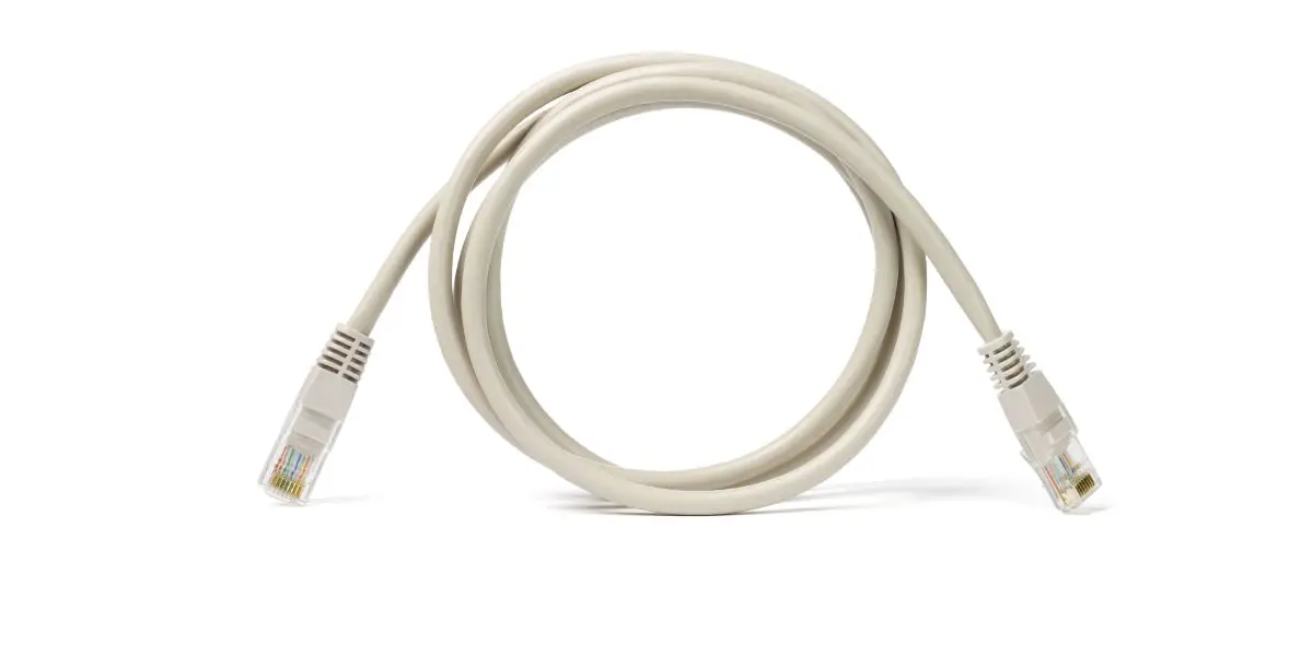 AdobeStock_36065492 white Network cable coiled on white background