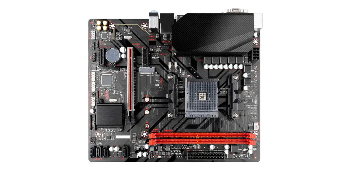 AdobeStock_413259510 black computer mainboard or motherboard of a pc in micro atx format with red RAM memory sockets isolated white background.