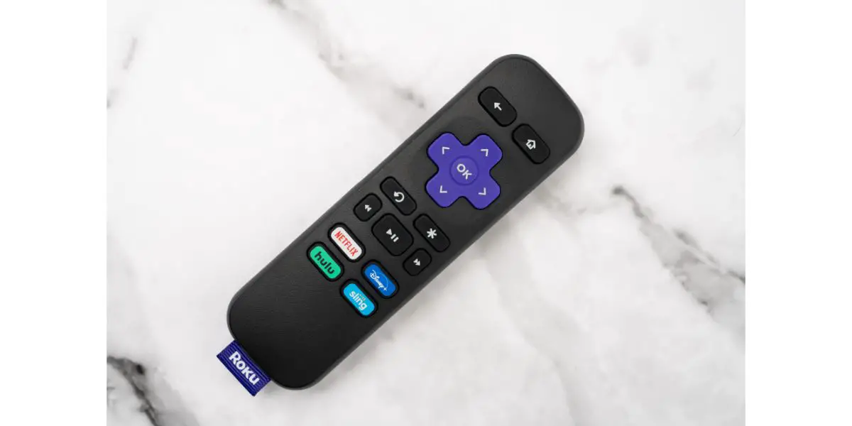 AdobeStock_419290299_Editorial_Use_Only Roku remote for streaming service on marble background
