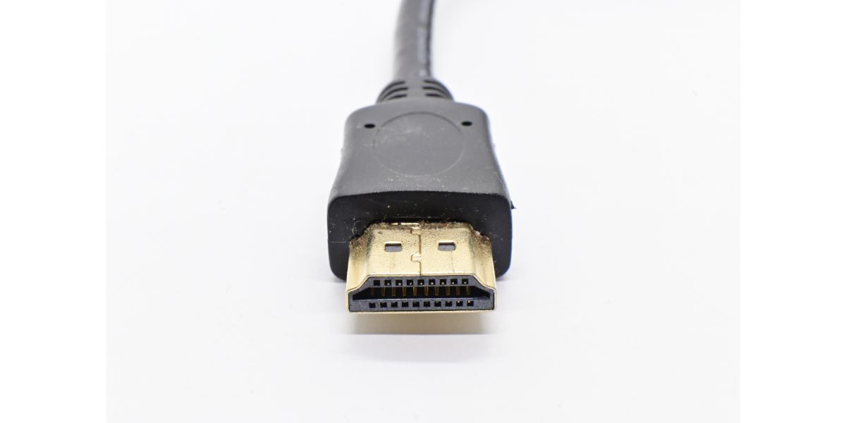 AdobeStock_440456276 HDMI cable showing connectors isolated on white background.