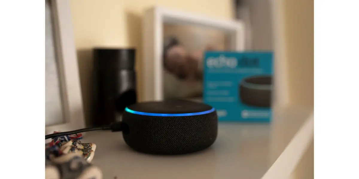AdobeStock_449007233 Amazon Echo Dot smart speaker with built-in Alexa voice assistant, home office