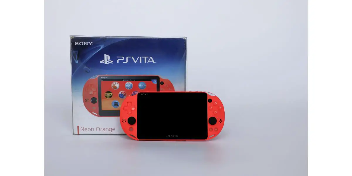AdobeStock_461871666_Editorial_Use_Only Sony PlayStation Vita portable Neon Orange edition with box