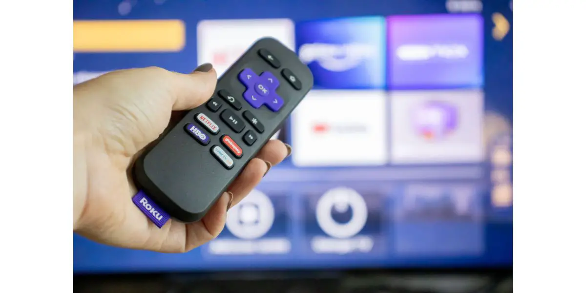 AdobeStock_477528281_Editorial_Use_Only Roku Express, TV box device with streaming service and infrared remote control - with HBO Max, Netflix, Spotify and others.