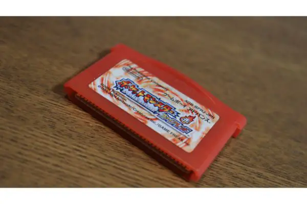 AdobeStock_502498889_Editorial_Use_Only A nintendo gameboy advance japanese firered Pokemon video games cartridge and plastic case