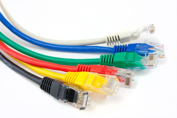 colored ethernet cables on white background