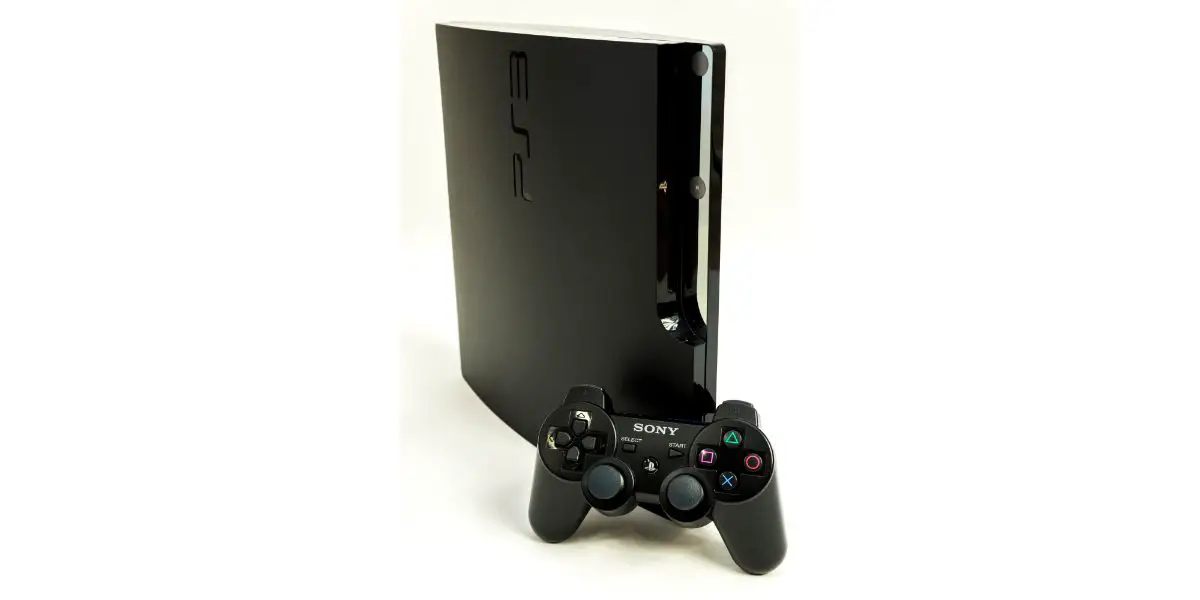 Depositphotos_22836968_L Playstation 3 on its side with gamepad white background