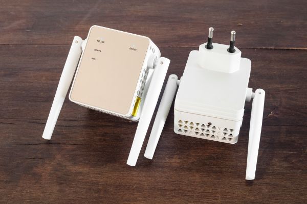 Depositphotos_240129800_S Detail of Wifi range extender