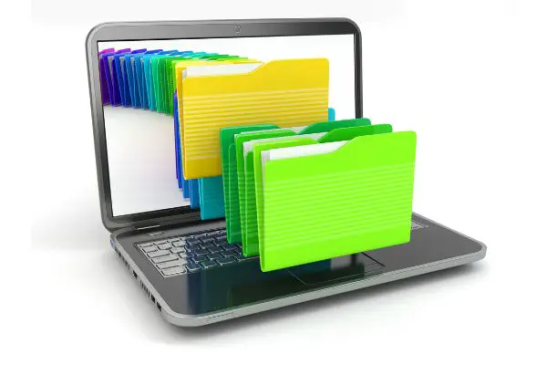 Depositphotos_32706633_S Laptop and computer files in folders