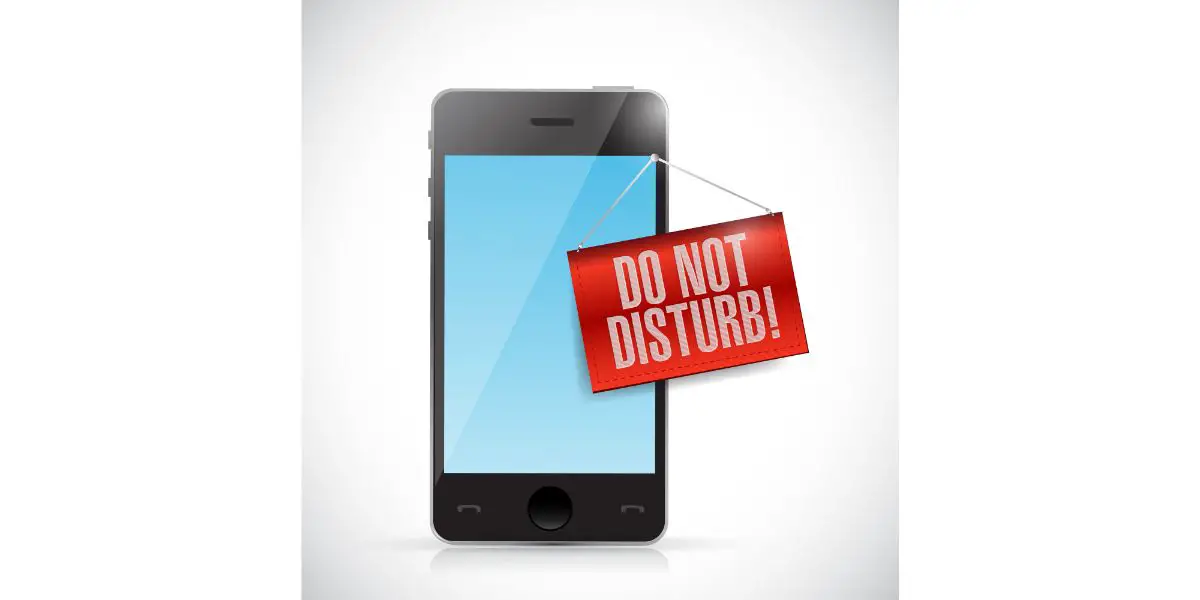 Depositphotos_34723643_L Phone with a do not disturb hanging sign. White background