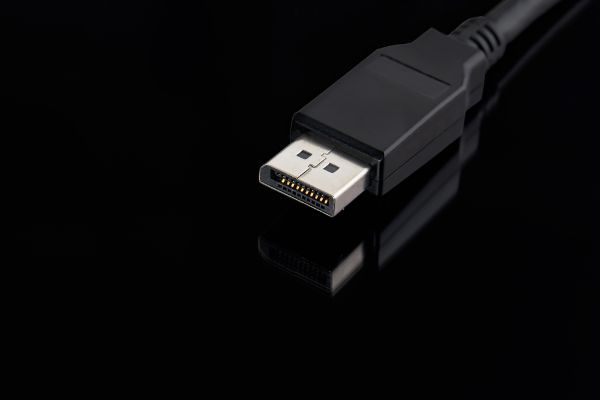 Depositphotos_445262356_S Display port cable plug close up over black background