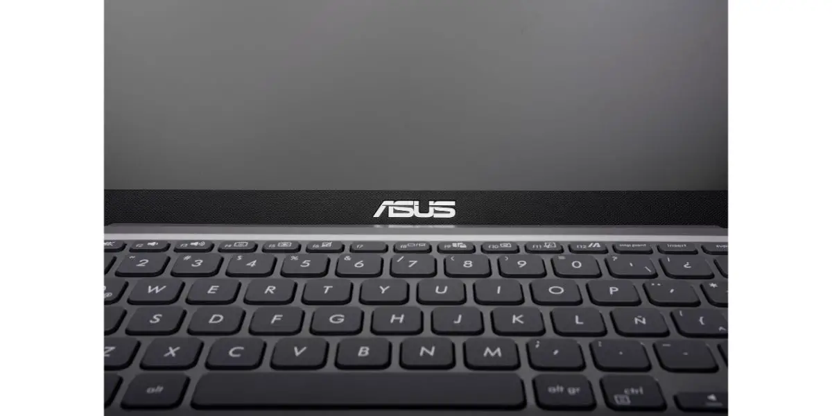 Depositphotos_488562230_L Asus Laptop model X415JA, Asus Laptop Keyboard Detail with focus on logo and keyboard letters